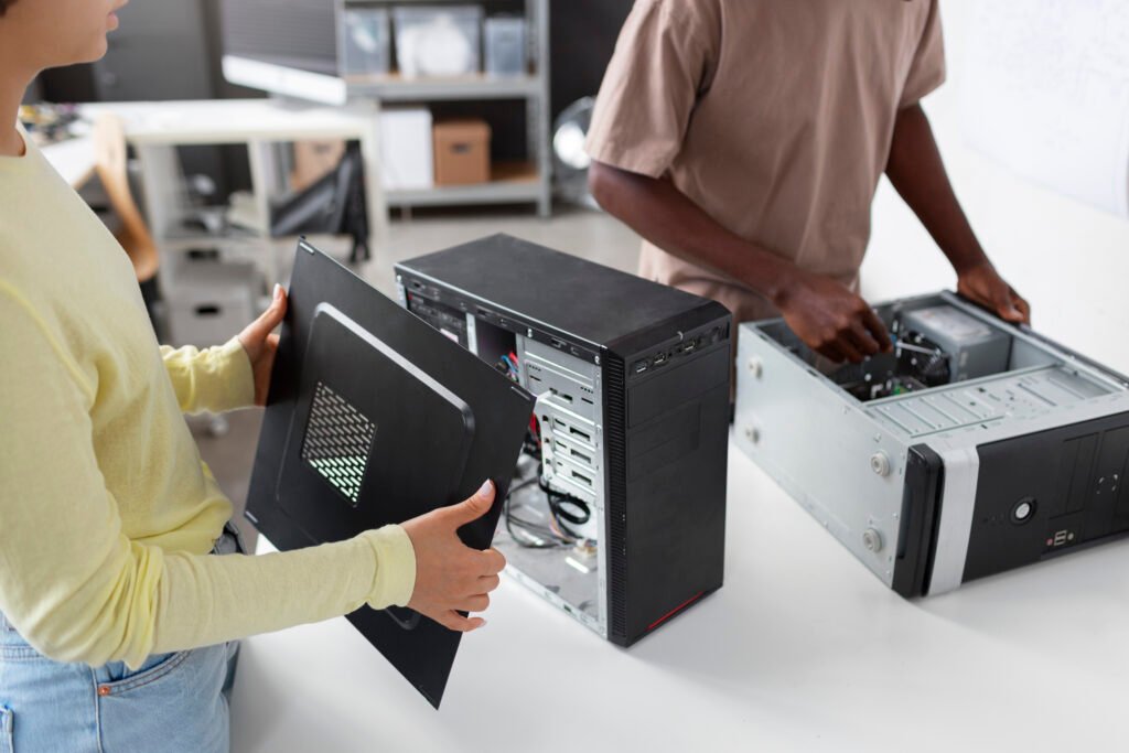 people-repairing-computer-chips - Kanineetech System Solutions